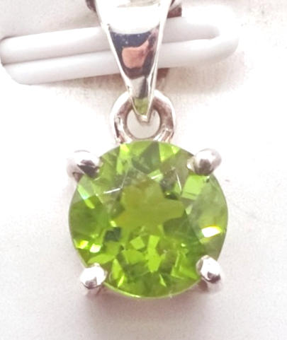 à propos du peridot serti